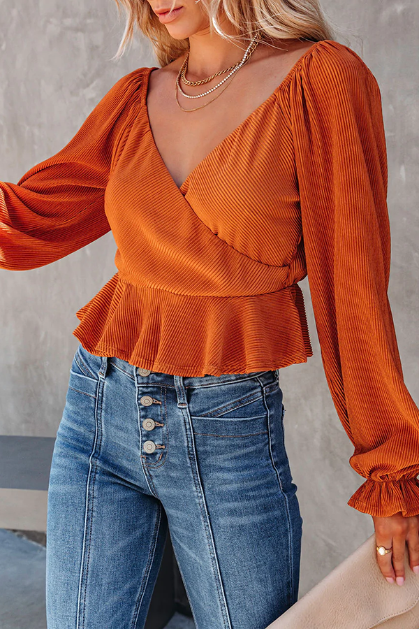 Everything and More Pleated Peplum Top